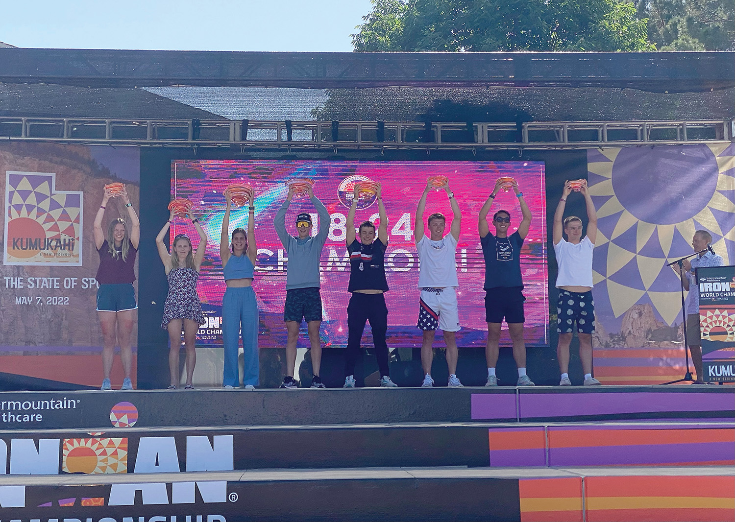 Out of the top five for Men’s 18-24 Triathlon at the Ironman World Championship, (middle-left) Plewes placed first place. Left: Top three females for Women’s 18-24 Ironman triathlon race, and top five males for 18-24.
